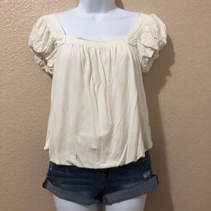 White puff sleeved top